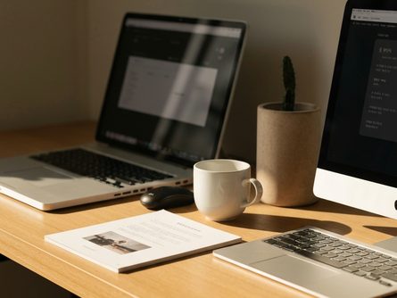 손으로 잡은 대출 확인서와 도장, 신분증 클로즈업, 흐릿한 은행 창구 배경